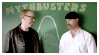 Two Men in Front of Blackboard